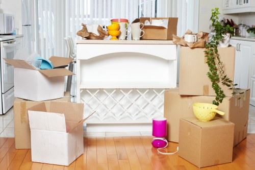 Packed boxes and furniture ready for professional removals service