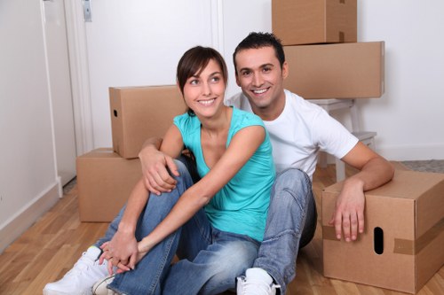 Careful loading of household items for a move in Harringay