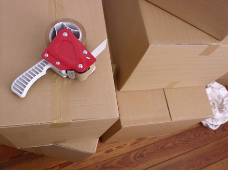 Packed household belongings prepared for removal truck hire