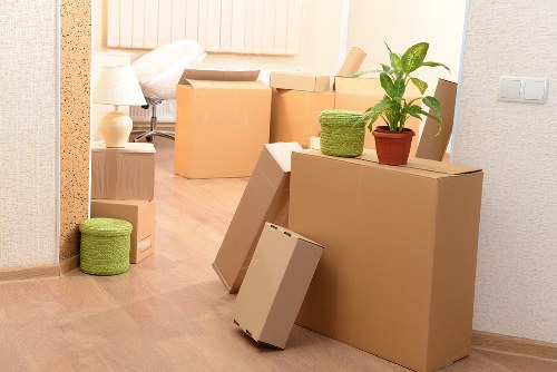 Professional Harringay moving team handling furniture transport carefully